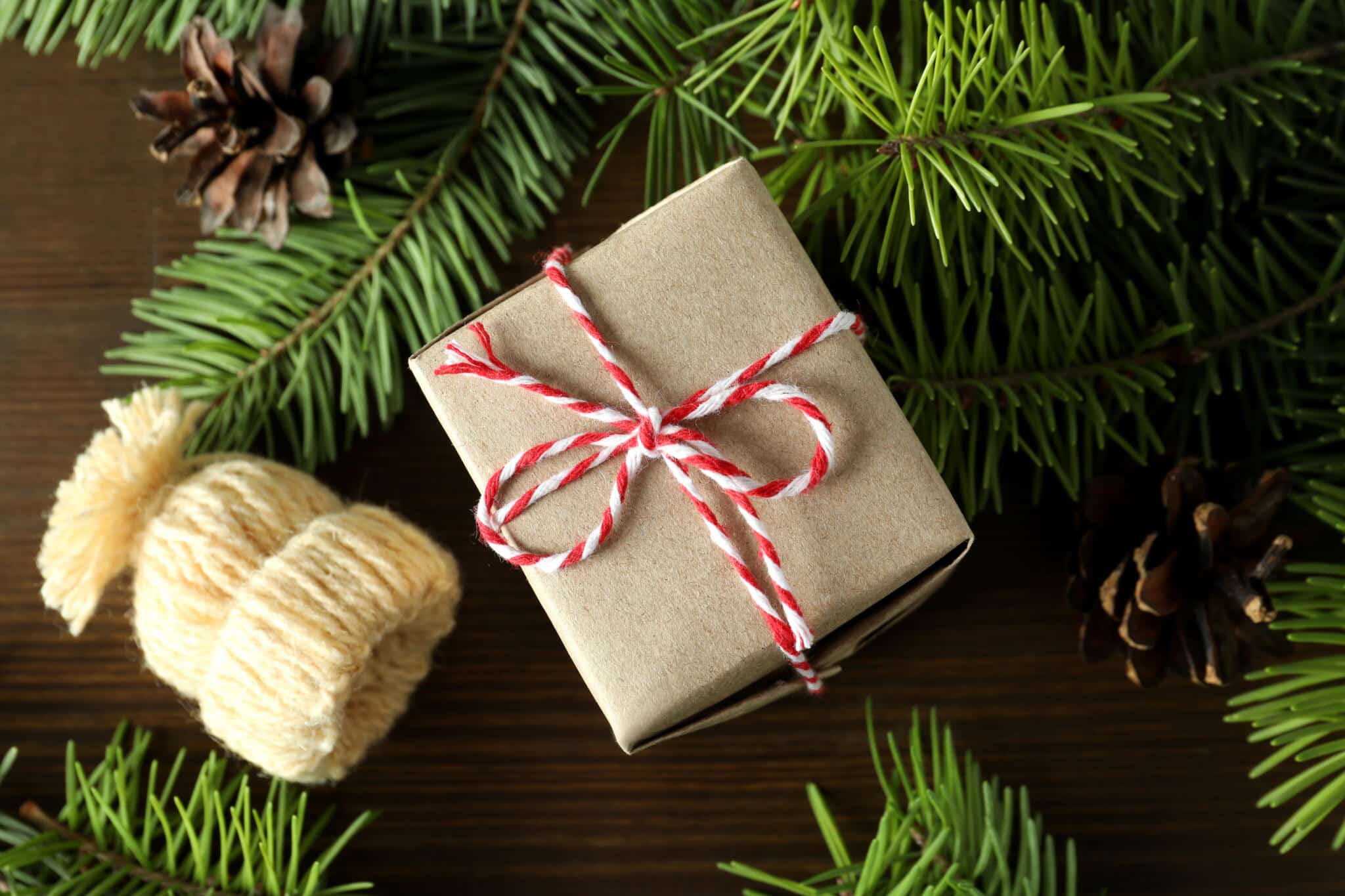 christmas concept with gift on wooden background