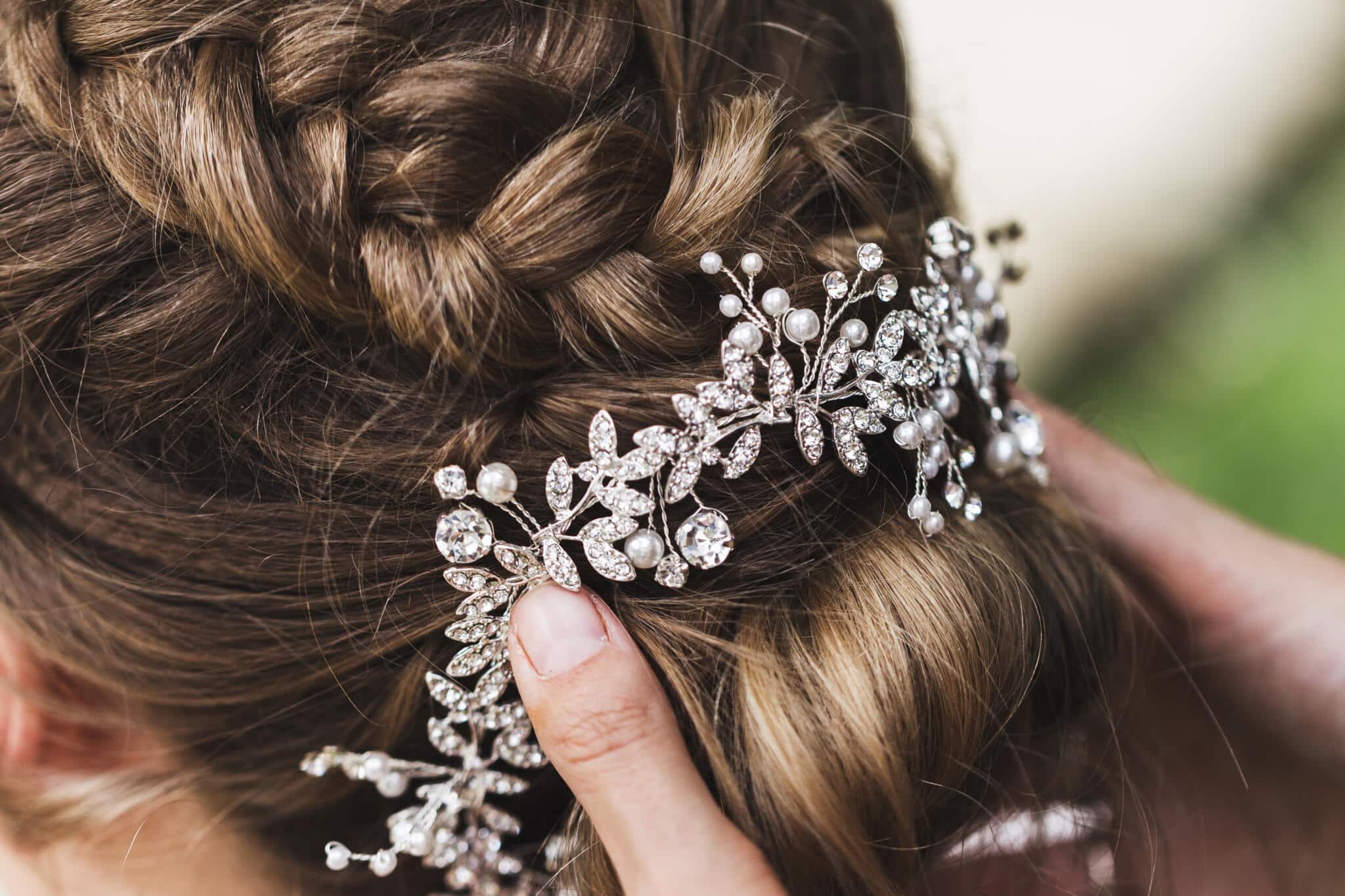 hairpin in the bride's hair, wedding hairstyle with accessories