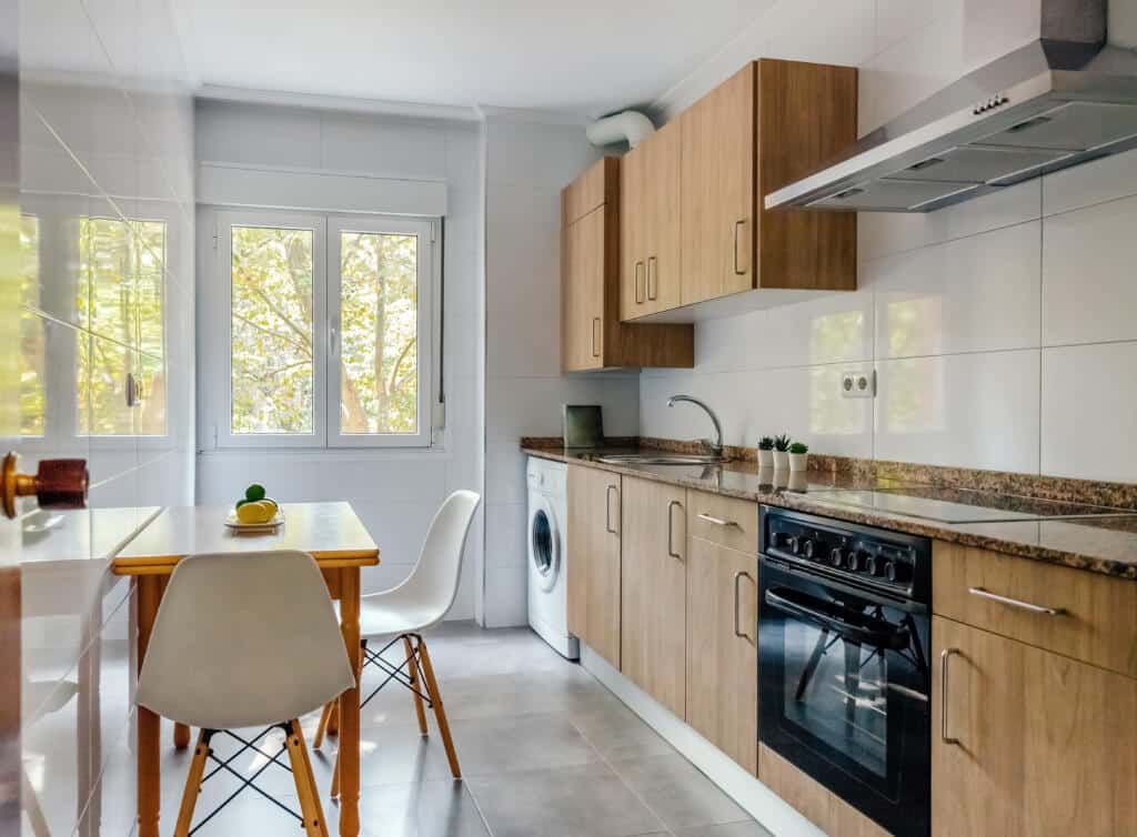 kitchen interior with furniture and appliances